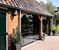 Overkapping aan bestaande woning